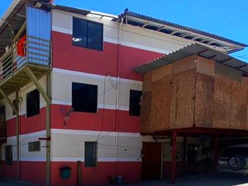 ARQUITECTURA CASA ESQUINERA ECUADOR