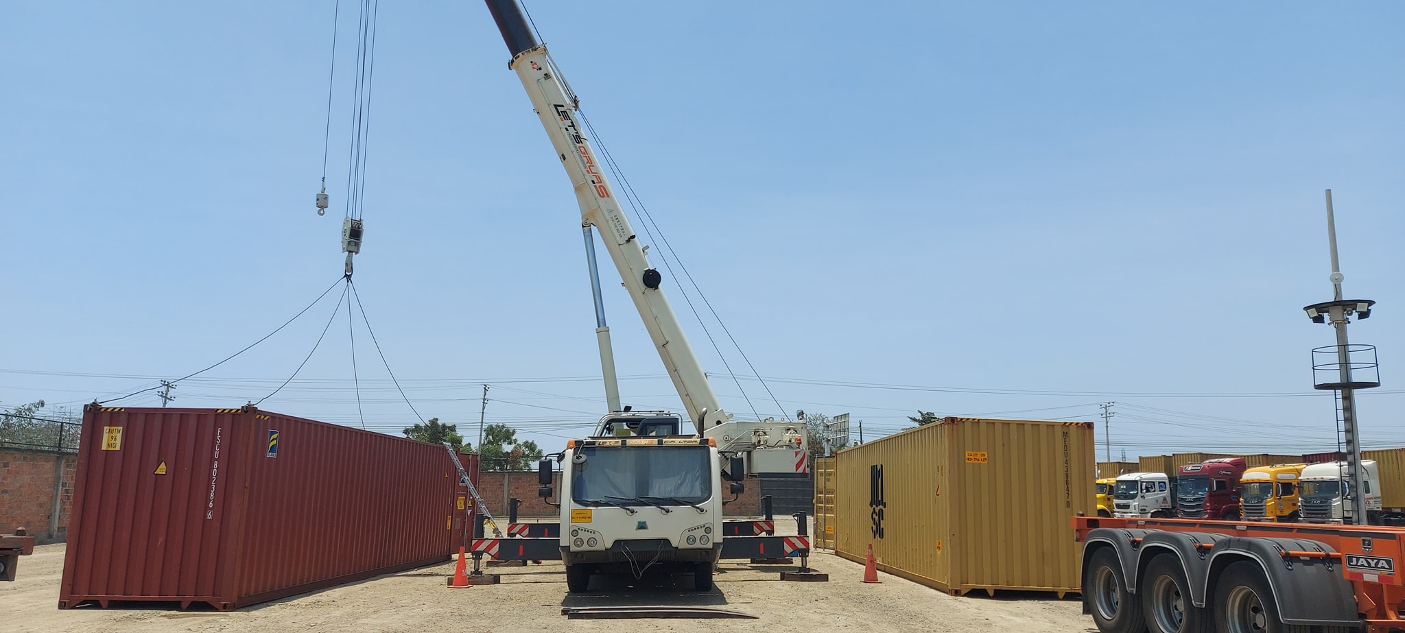 Servicio de grua cama baja Ecuador 