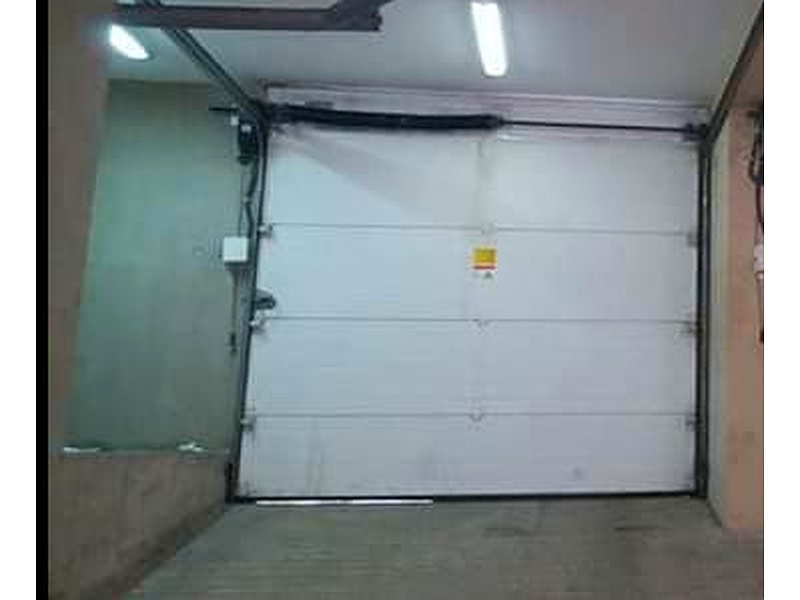 Puerta Garaje Motorizada de PVC con Revestimiento de Aluminio Ecuador