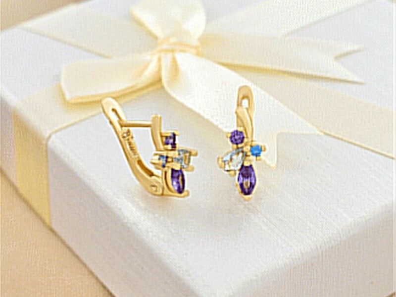 Aretes hoja con circones de colores Quevedo